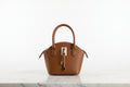 Classic Black & Brown Strap Bag - Timeless Sophistication